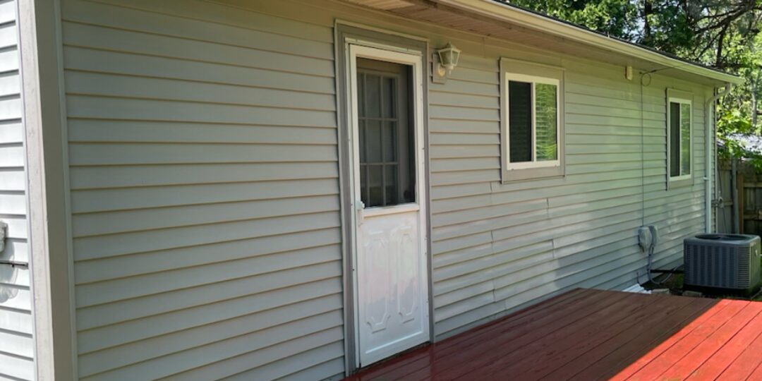 Back of house & deck after power washing