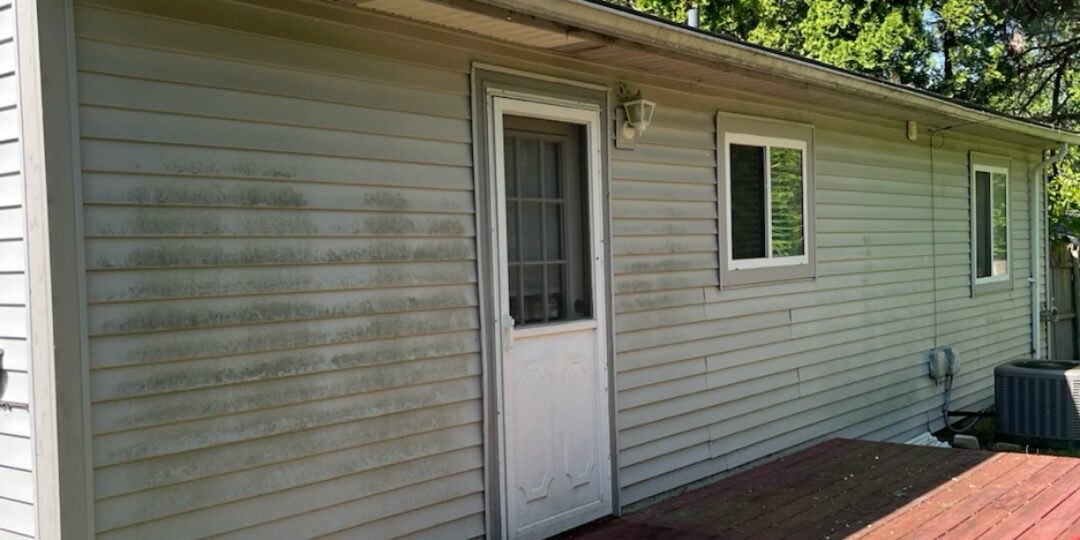 Back of house & deck before power washing