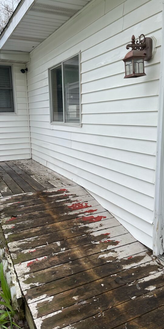 Siding by the ramp after power washing
